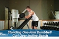 Exercise Guides: Standing One-Arm Dumbbell Curl Over Incline